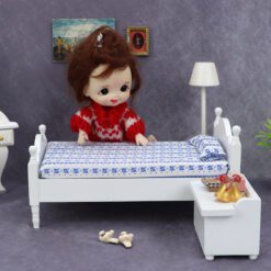 Miniature single wooden bed with floral bedding for dollhouse