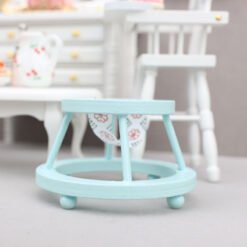 Miniature wooden walker for dollhouse nursery, available in multiple colors.