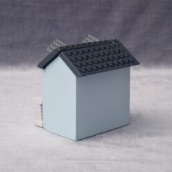 Miniature dollhouse in pastel colors with openable doors and roof, designed for 1/12 scale.