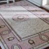 Aubusson Pink Floral Medallion Miniature Rug 2 Elegant miniature rug in pink and beige with a floral medallion and intricate borders.