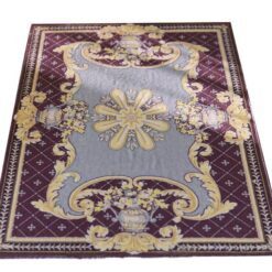 Burgundy miniature rug with yellow floral motifs, featuring a central floral medallion and ornate scrolls.