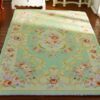 Victorian Miniature Rug - Soft Green with Floral and Medallion Design 2 Miniature Victorian rug in soft green with floral patterns and medallion detail.