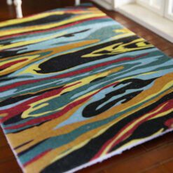 Modern abstract miniature rug with colorful flowing pattern