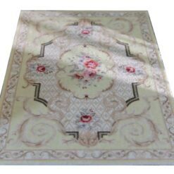 Light yellow Victorian miniature rug with floral medallion and scroll borders in beige and green.