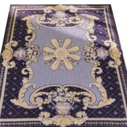 Purple miniature rug with yellow floral motifs and a central floral medallion design.