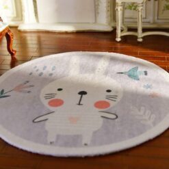 Miniature rug with a cute bunny, flowers, and a bird in pastel tones.