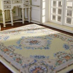 Miniature Victorian rug with yellow background and floral border