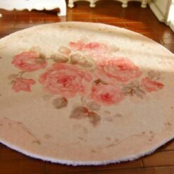 Miniature shabby chic rug with a pink rose bouquet and soft floral details.