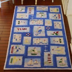 Multi-square nautical themed miniature dollhouse rug with sailing motifs