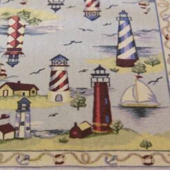 Coastal scene miniature dollhouse rug with lighthouses and sailboats