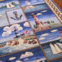 Miniature dollhouse runner with multiple lighthouse and sailing scenes