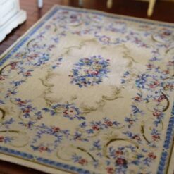 Miniature dollhouse rug with blue and pink floral Aubusson design
