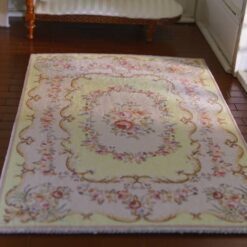 Aubusson style miniature rug with yellow floral border