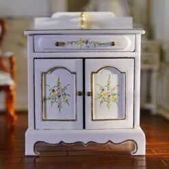 Victorian miniature vanity sink with floral hand-painted design and gold accents