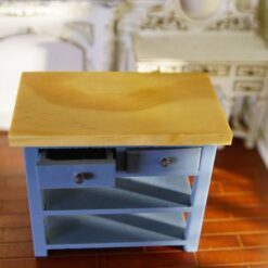 Blue miniature kitchen island with a wooden top and open shelves.
