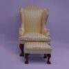 Baroque-style miniature armchair and ottoman with striped fabric