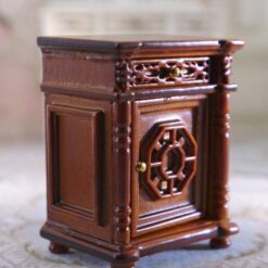 Jacobean-style miniature wooden nightstand with carvings