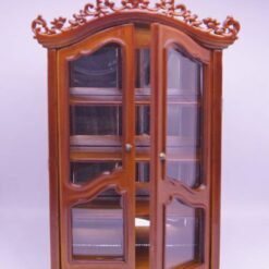 Gothic-style miniature wooden cabinet with mirror and drawers