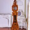 Louis XV-style miniature walnut grandfather clock with ornate carvings