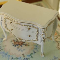 Rococo-style white miniature dresser with golden accents for dollhouses