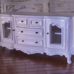 Miniature white buffet cabinet with gold details