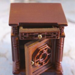 Jacobean-style miniature wooden nightstand with carvings