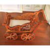 Miniature Victorian wooden baby carriage with cushion