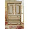 Miniature wooden wardrobe with drawers and intricate carvings