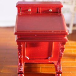 Baroque-style miniature writing desk with red gloss finish and intricate carvings
