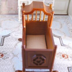 Jacobean-style miniature wooden rocking crib