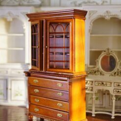 Miniature hutch with glass doors and a polished wood finish.