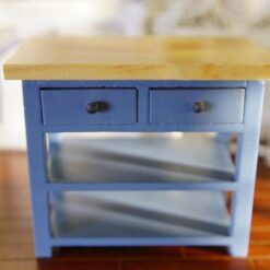 Blue miniature kitchen island with a wooden top and open shelves.