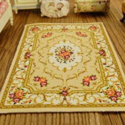 Miniature Aubusson floral rug in soft pastel colors with vintage design.