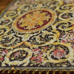Miniature Aubusson rug with acanthus scroll design and ornate pattern.
