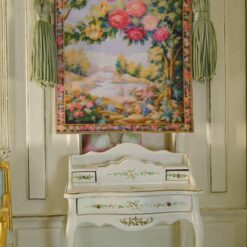 Blooming floral arch with vivid roses and a countryside backdrop in a miniature Aubusson tapestry.