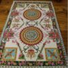 Miniature Royal Savonnerie Aubusson rug with luxurious intricate patterns.
