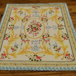 Miniature pastel Aubusson rug with floral motifs in soft colors