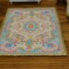 Miniature Louis XV French Aubusson rug in sky blue and cream with floral motifs.