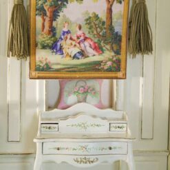 Miniature Aubusson tapestry with three figures in a forest setting, surrounded by trees and delicate blossoms.