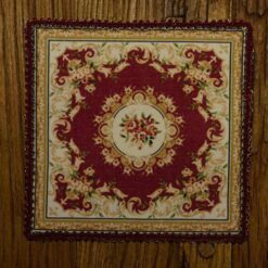 Burgundy red Aubusson miniature rug with intricate floral design, ideal for luxury dollhouses.