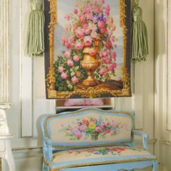 Golden vase overflowing with roses and wildflowers framed by intricate gold, a miniature Aubusson tapestry.