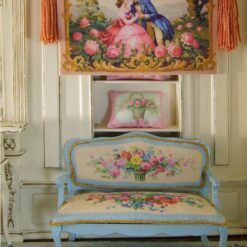 Romantic couple in a floral garden with golden accents, a miniature Aubusson tapestry.
