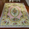 Pink floral Victorian rug with gold detailing