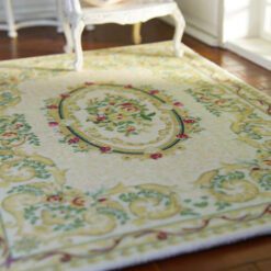 Modern Aubusson-style miniature rug with geometric and floral patterns in blue and beige