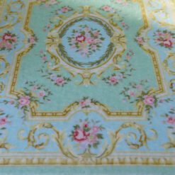 Light blue Victorian floral rug with roses and golden accents