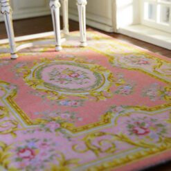 Pastel pink Victorian rug with roses and gold scrollwork
