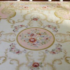 Soft pink Victorian rug with roses and golden swirls