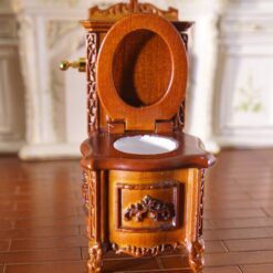 Louis XV-style miniature wooden toilet with ornate carvings