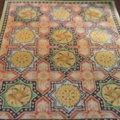 Louis XV Aubusson miniature rug with floral medallion and soft tones