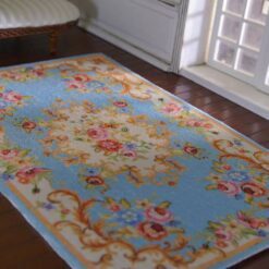 Victorian Rococo miniature rug with blue floral and gold scrollwork